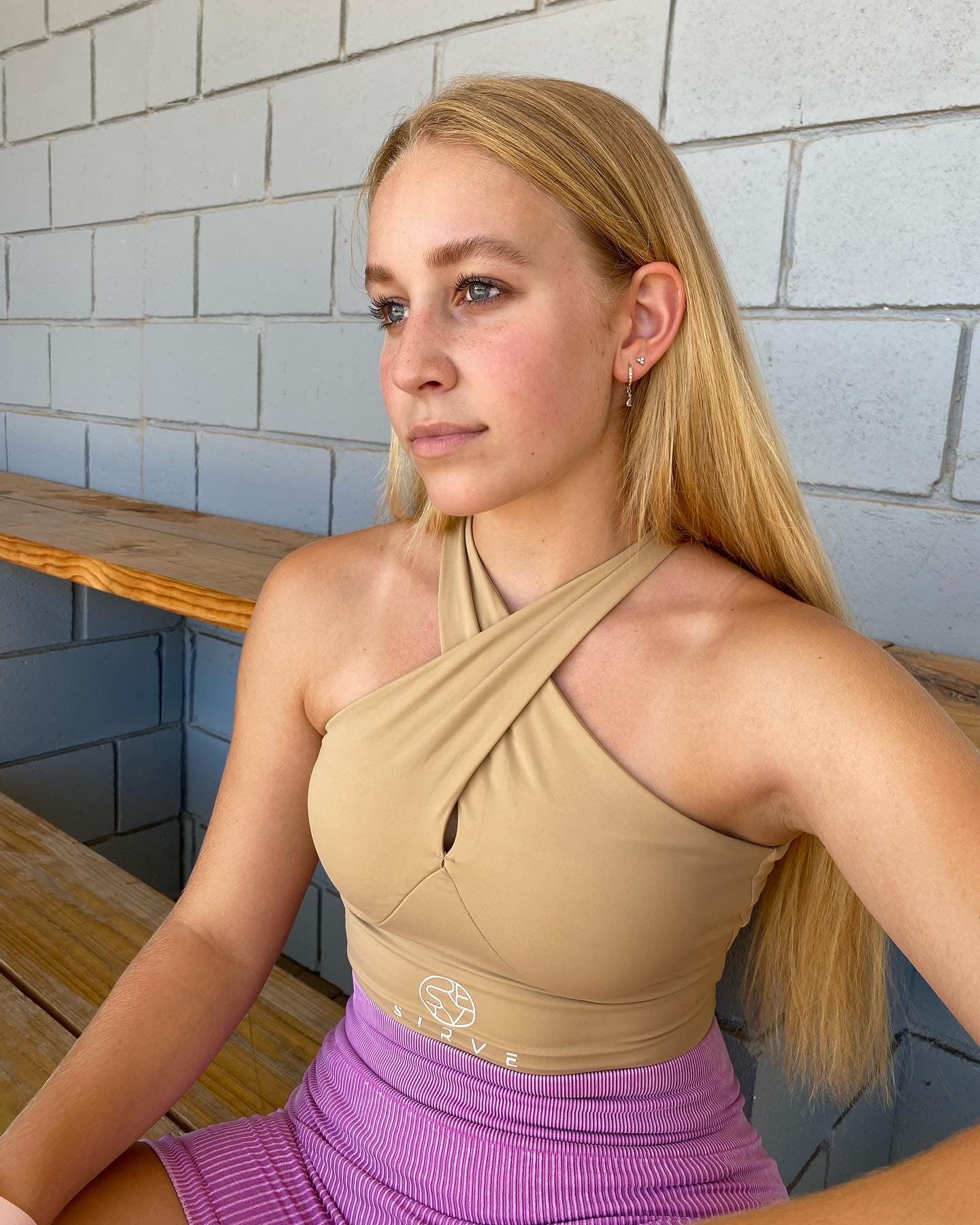 Cross over body top in beige with built in support